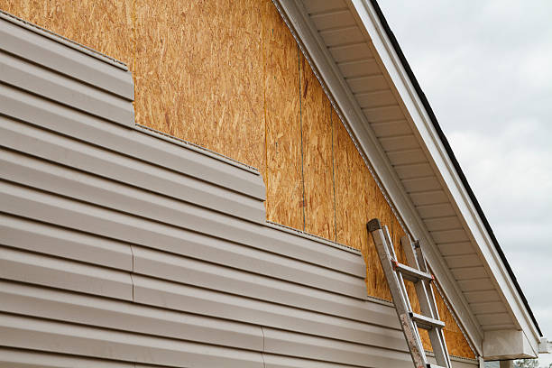 Professional Emergency Siding Repair technician working in Clinton, NY